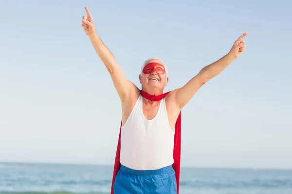 Senior man wearing superman costume — Stock Photo, Image