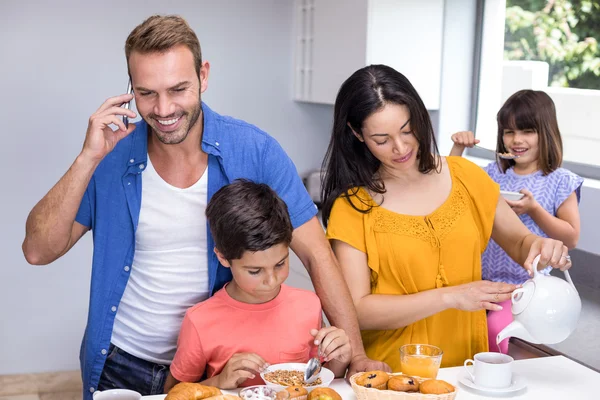 Happy family in kitchen — Stock Photo, Image