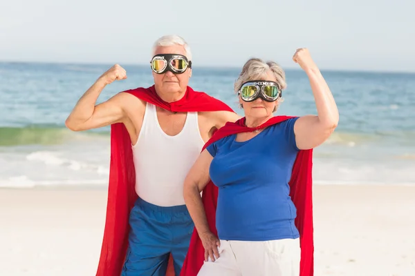 Pareja mayor vistiendo traje de superman —  Fotos de Stock