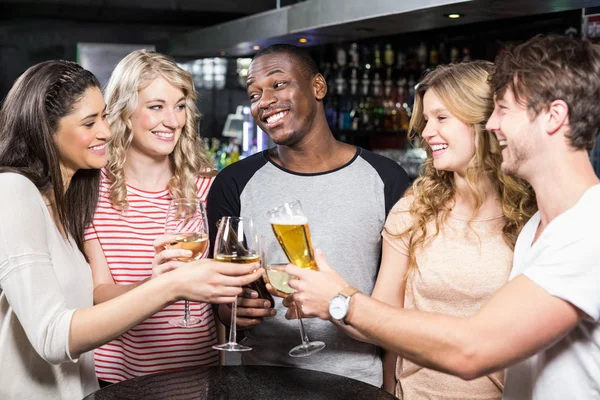 Group of friends toasting with beer and wine Stock Photo