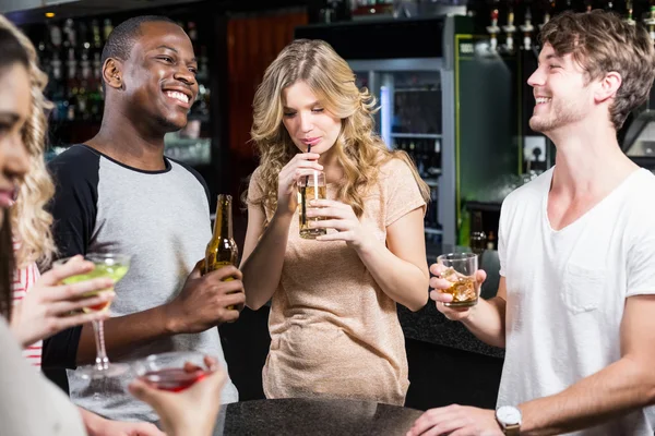 Group of friends having a drink Royalty Free Stock Images