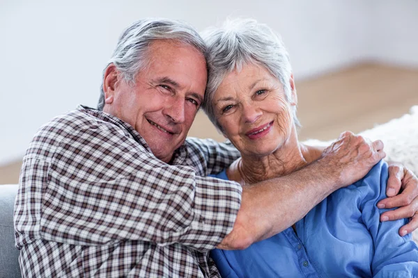 Portrait of senior couple embracing each other — Stock Photo, Image