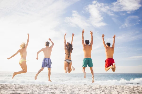 Happy friends jumping together — Stock Photo, Image
