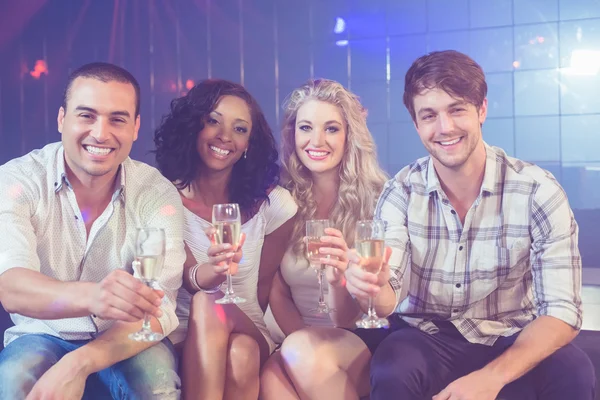 Friends celebrating with champagne — Stock Photo, Image