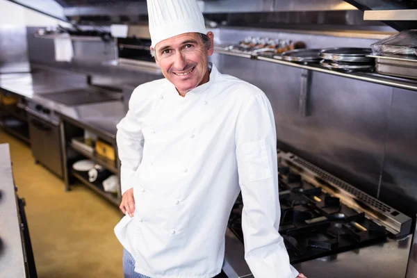 Chef standing in commercial kitchen — Stock Photo, Image