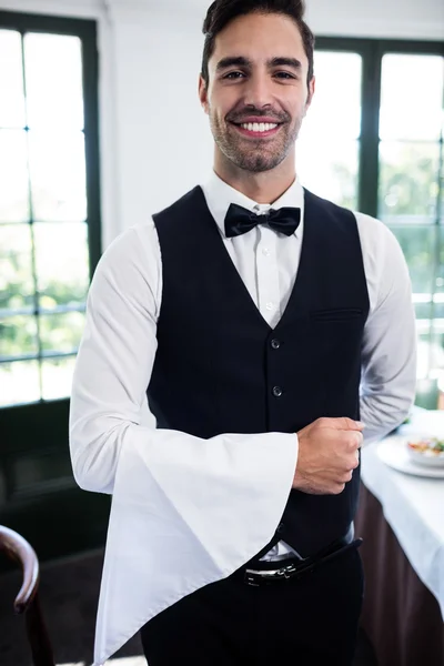 Waiter smiling at camera — Stock Photo, Image