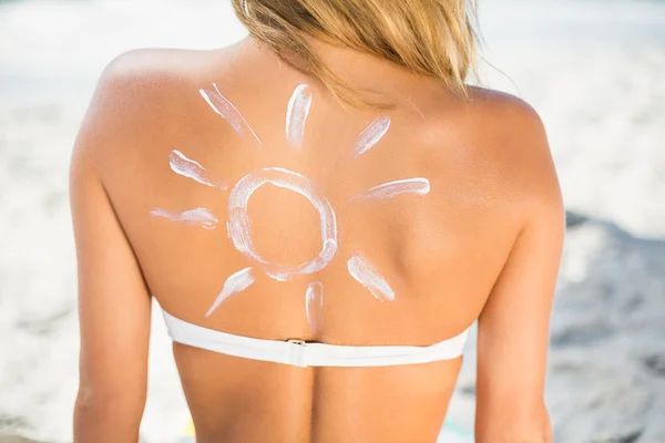 Woman with sunscreen on her skin — Stock Photo, Image