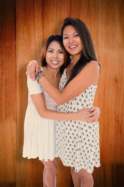 Two sweet sisters hugging each other — Stock Photo, Image