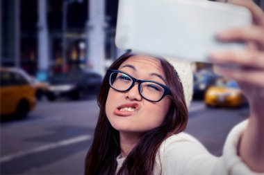 Asian woman taking selfie clipart