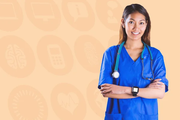 Sammansatt bild av asiatiska sjuksköterska med stetoskop korsning armar — Stockfoto