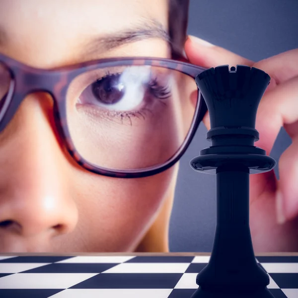 Businesswoman holding her eyeglasses — Stock Photo, Image