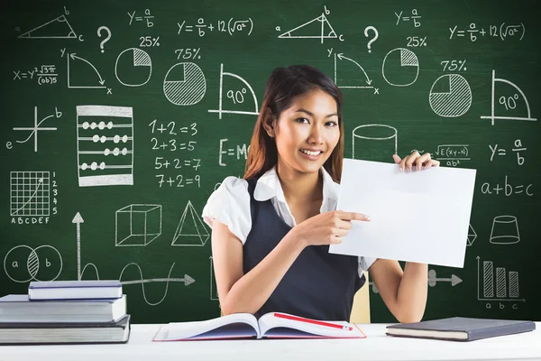 Businesswoman pointing sheet of paper — Stock Photo, Image