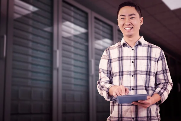 Happy man using tablet computer — Stock Photo, Image