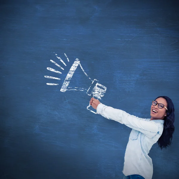 Composite image of asian woman posing for camera — Stock Photo, Image