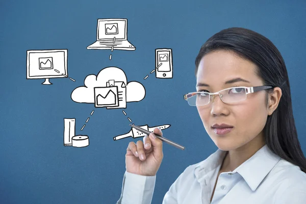 Attractive businesswoman holding pen — Stock Photo, Image