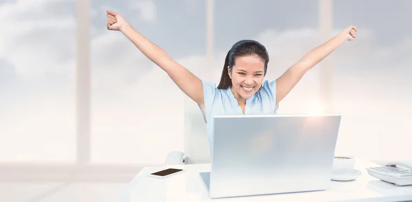 Celebrating woman with arms raised — Stock Photo, Image