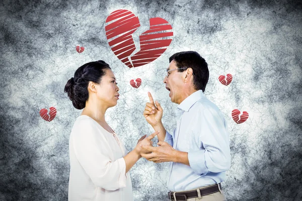 Older asian couple having an argument — Stock Photo, Image