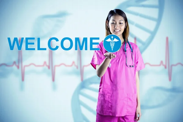 Asian nurse stretching out hand — Stock Photo, Image