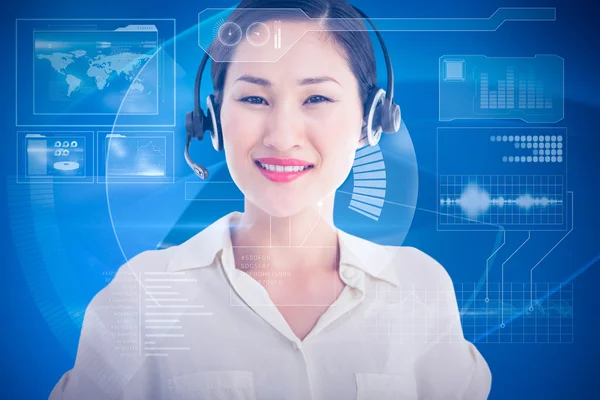 Ejecutiva femenina con auriculares —  Fotos de Stock