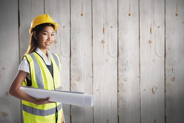 Architect woman with yellow helmet and plans — Stock Photo, Image