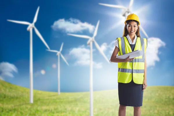 Architect woman with yellow helmet and plans — Stock Photo, Image