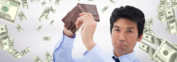 Businessman showing his empty wallet — Stock Photo, Image