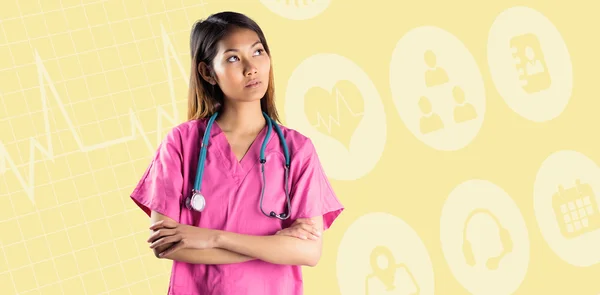 Asiatische Krankenschwester kreuzt die Arme — Stockfoto