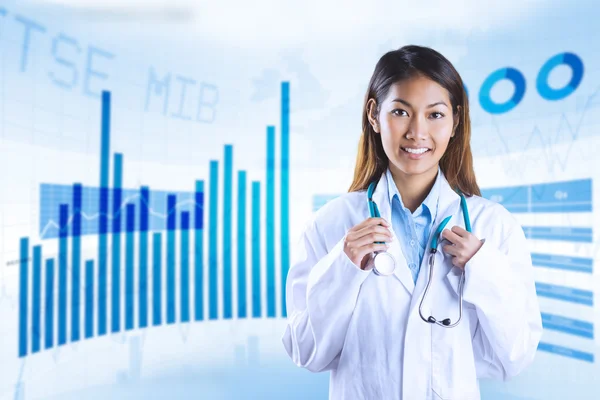 Asian doctor holding stethoscope — Stock Photo, Image