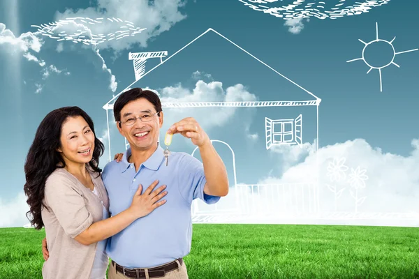 Couple holding a set of keys — Stock Photo, Image