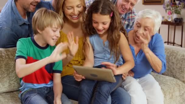 Multi generation family using tablet — Stock Video