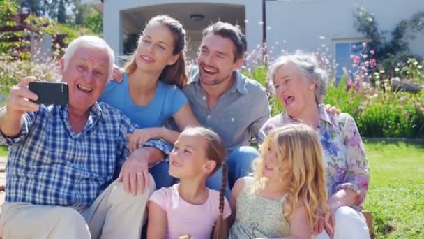 Multi generation family taking selfie — Stock Video