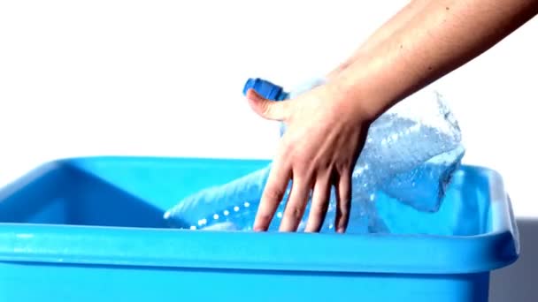 Feminine hands throwing bottles in the bin — Stock Video