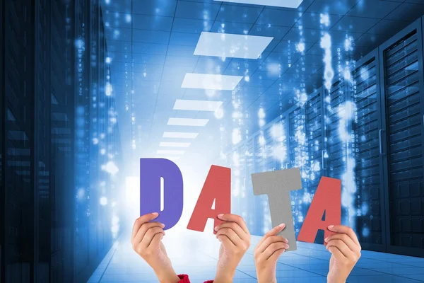 Hands holding up data in server room — Stock Photo, Image