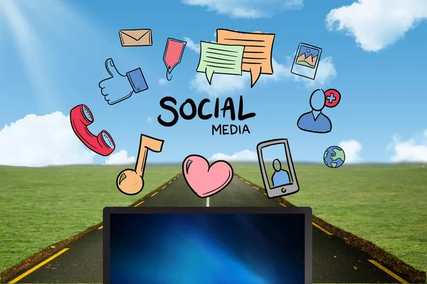 Laptop com ícones de mídia social — Fotografia de Stock