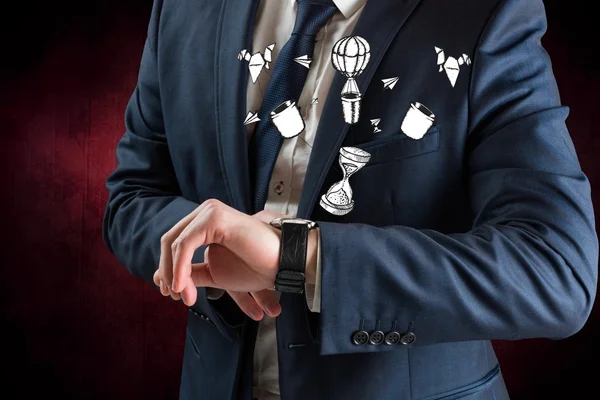 Businessman looking at his watch — Stock Photo, Image