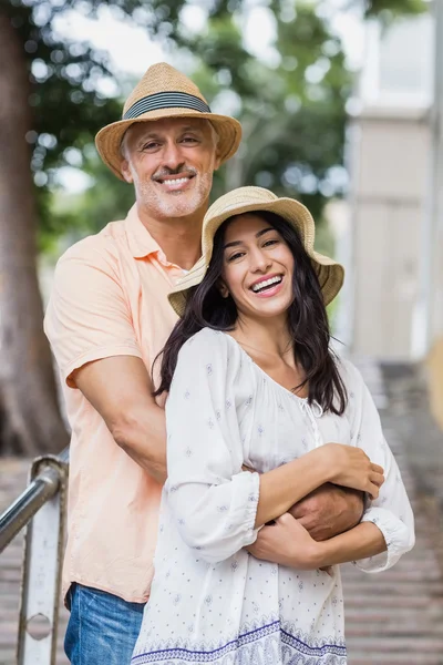 Smiling couple embracing — Stock Photo, Image