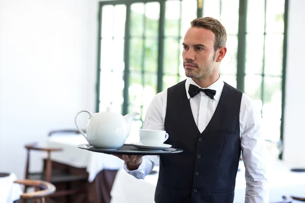 Waiter carrying a tray — Stock Photo, Image