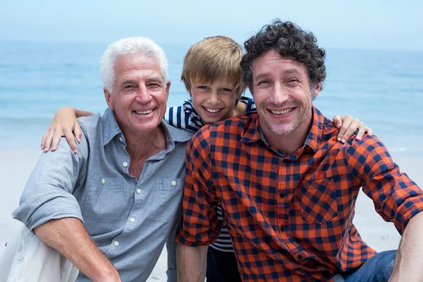 Boy with father and grandfather beach — Stock Photo, Image