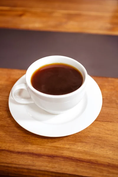 Kopje koffie op een tafel — Stockfoto