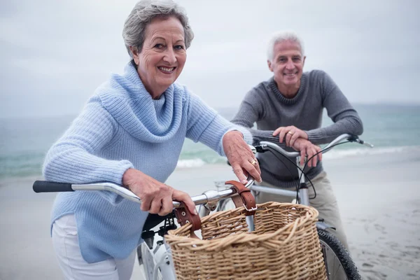Senior couple with their bikes — Stock Photo, Image