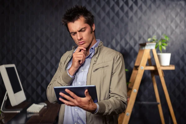 Creative businessman using tablet — Stock Photo, Image