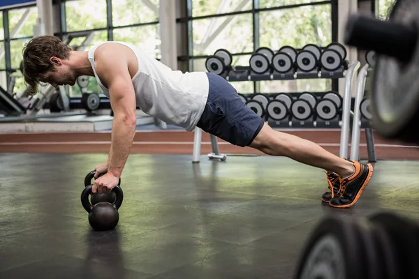 Man working out with kettlebell — Stock Photo, Image