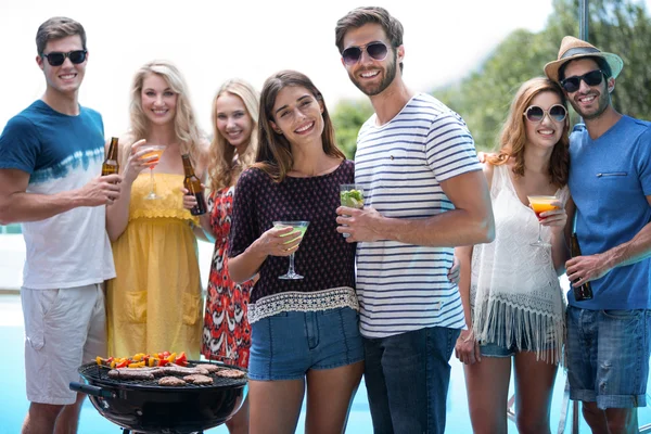 Friends holding a glasses — Stock Photo, Image