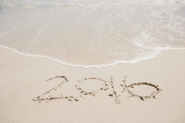 2016 in sand on the beach — Stock Photo, Image
