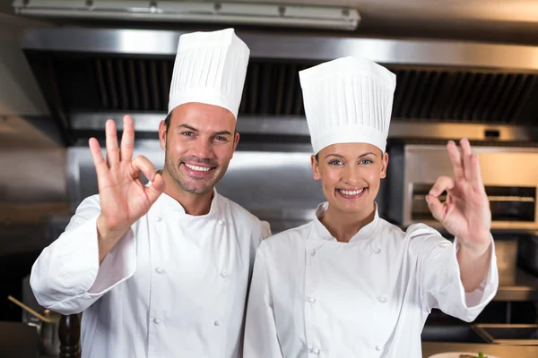 Chefs showing ok signs — Stock Photo, Image