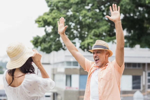 Woman photographing man — Stock Photo, Image