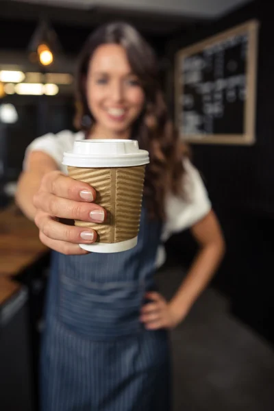 Barista holding disposable cup — Stock Photo, Image