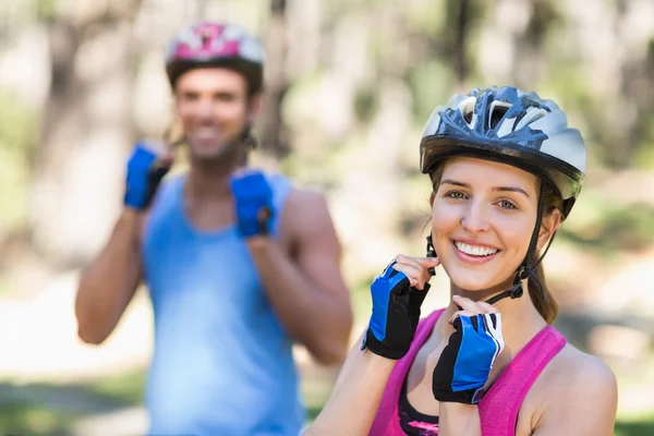 Bikers wearing helmet in forest — Stock Photo, Image