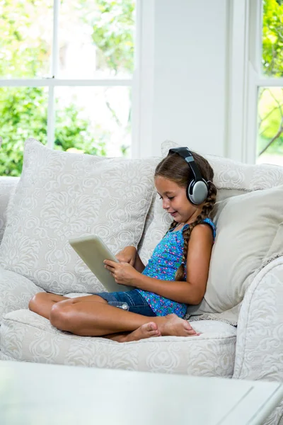 Girl using digital table — Stock Photo, Image