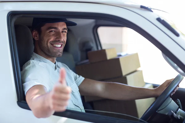 Delivery man showing thumb up — Stock Photo, Image